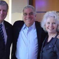 An alumnus with two T. Haas and Marcia